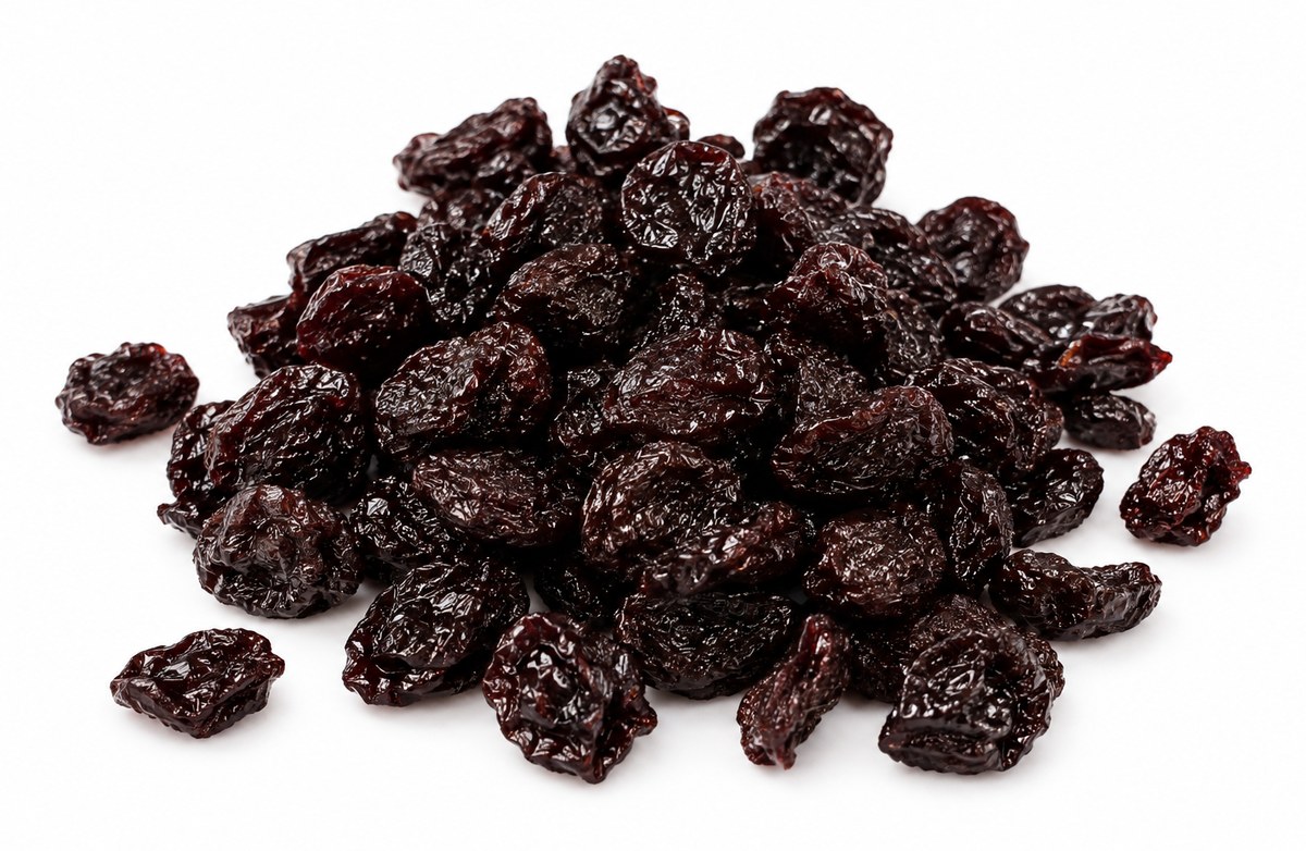 A pile of dark dried pitted sour cherries